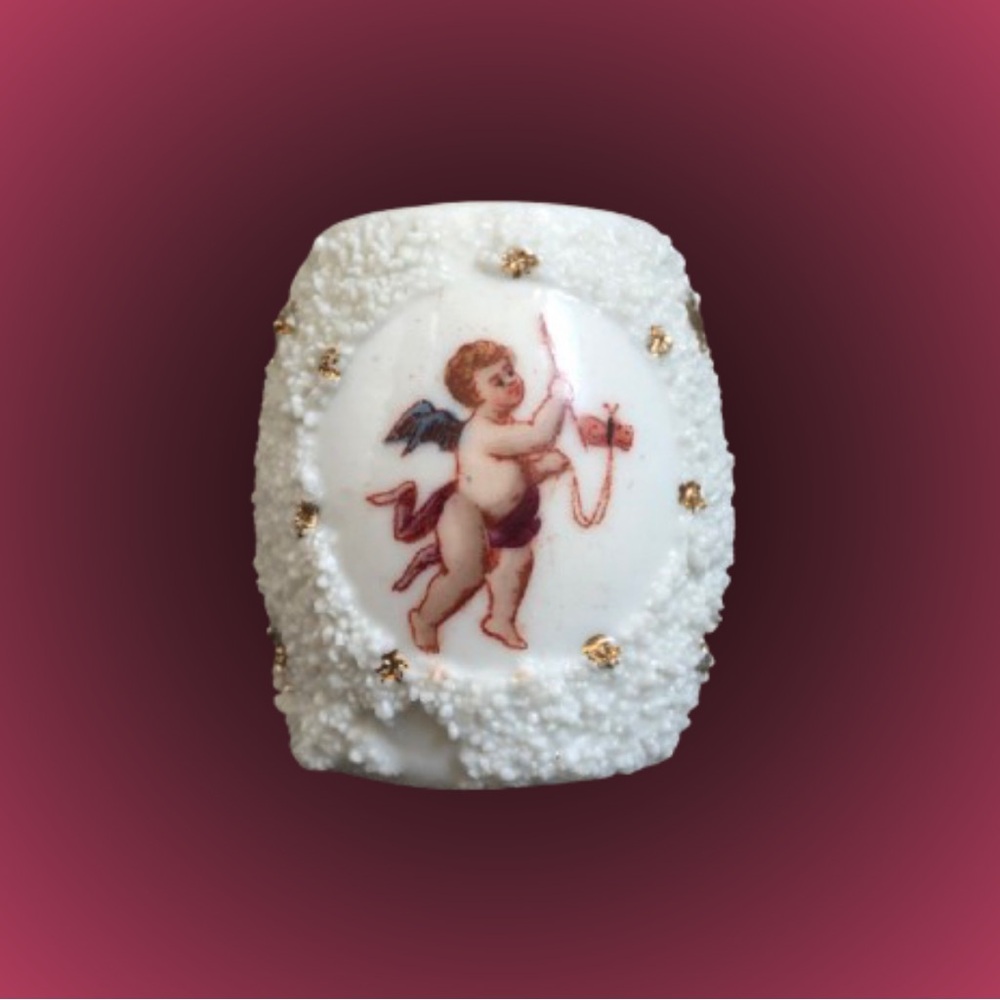 Vintage antique porcelain toothpick holder sand texture, cherub
